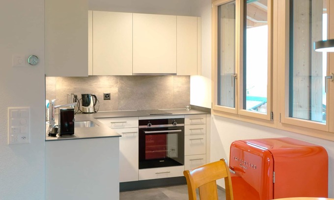 Faulensee Apartment | Apartment Eiger by Interhome