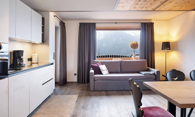 Carezza Apartment | Apartment "Angerle Alm Apt König Laurin" with Private Terrace, Shared Garden & Wi-Fi