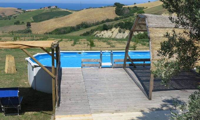 Cologna Spiaggia Villa | Apartment in villa with WIFI, hot tub, A/C, pool, TV, patio, pets allowed, panoramic view, parking