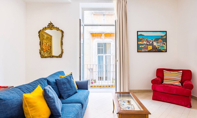 Montecalvario Apartment | Apartment with balcony in Palazzo Diaz by Wonderful Italy