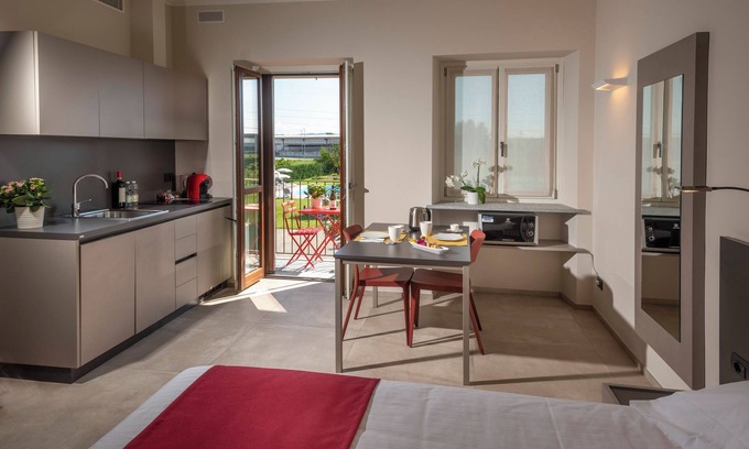 Castagnito Apartment | Appartamento Monolocale con Piscina - Residence Corte Bellora