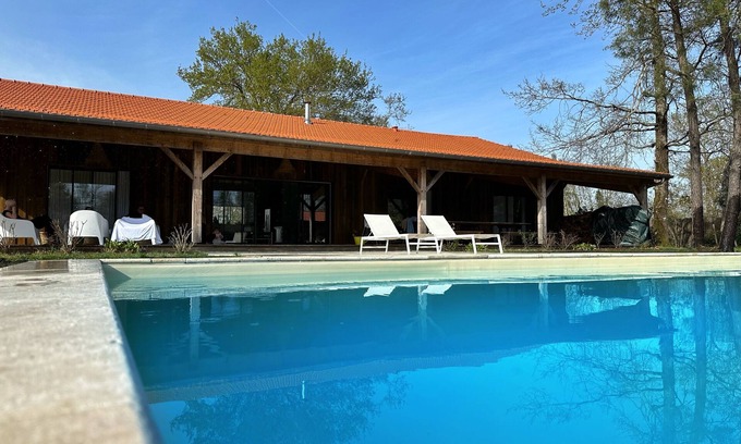 Solferino House | Architect-designed wooden house, covered terrace 100 m2, 30 minutes from the beach