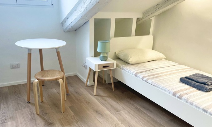San Salvario Apartment | Attic room Belfiore (B13)