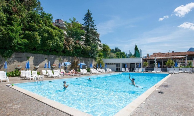 Susello Apartment | Attractive 2-room apartment with sunbath, pool and dream view