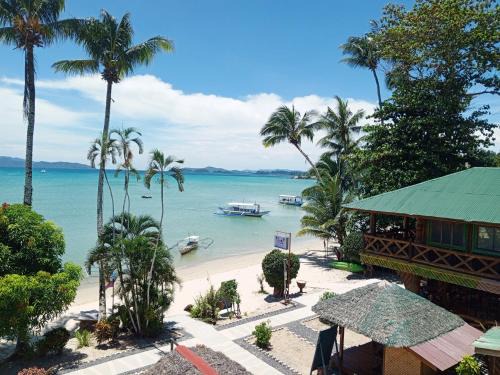 Port Barton Resort | Ausan Beach Front Cottages
