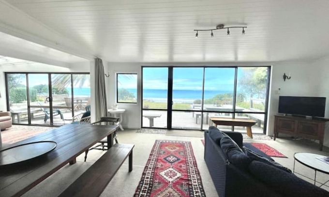 Wainui House | Awesome Wainui Spacious Holiday Home Overlooking the Surf - no pets.