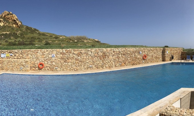 Marsalforn Apartment | Azure Cottage: Beautiful, modern 3 bedroom apartment with communal swimming pool