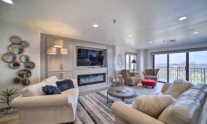 Afton Condo | Balcony & Lake View: Modern Condo in Monkey Island