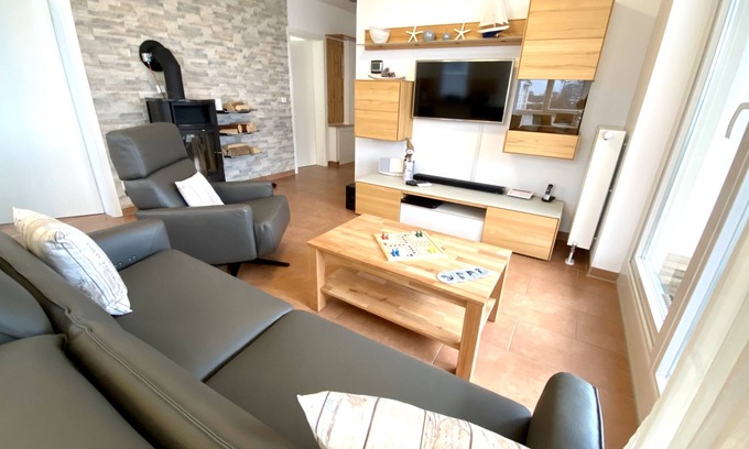 Grossenbrode Apartment | Baltic Sea view | large terrace | sauna scents | firewood | WLAN | beach chair