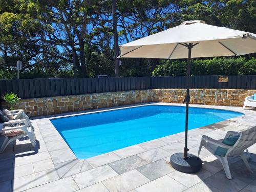 Bateau Bay Hotel | Bay House Motel