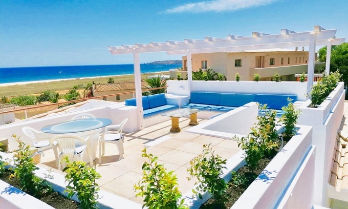 Meia Praia Apartment | Beachfront Apartment with Private Roof Terrace, BBQ, and Sea views