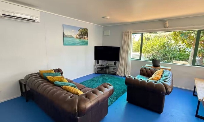 Tata Beach House | Beachside Bach Just across the road to Ligar Bay!