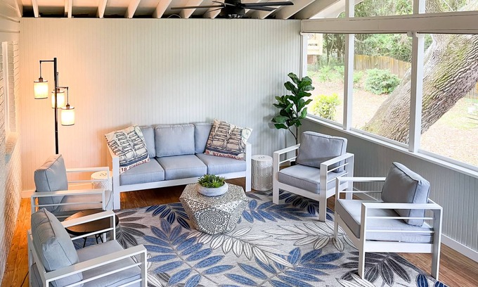 Isle of Palms House | Beachy haven with a beautiful screened in porch and big yard