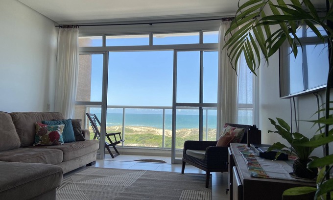 Lagoa Pequena Apartment | Beautiful apartment in front of the sea with view of the beach - 3 suites for 8 people