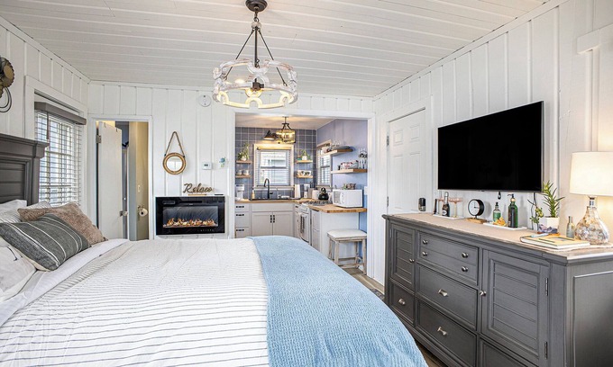 Linden Cottage | Beautiful boathouse with an all season hot tub, paddle boat and kayaks!