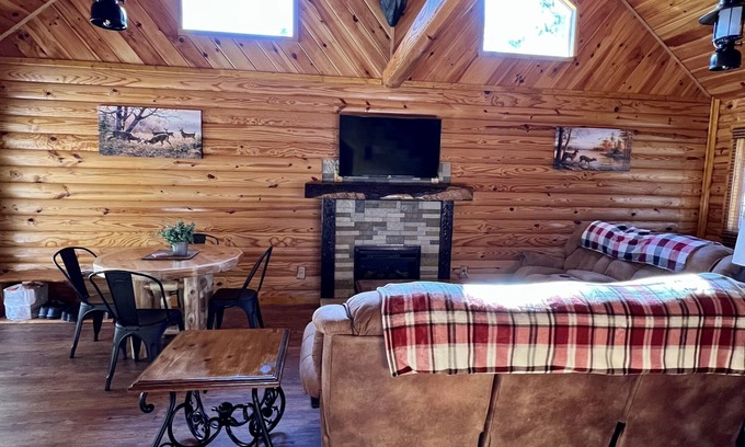 Louisa Cabin | Beautiful cabin with fireplace and wrap around porch and private upstair balcony
