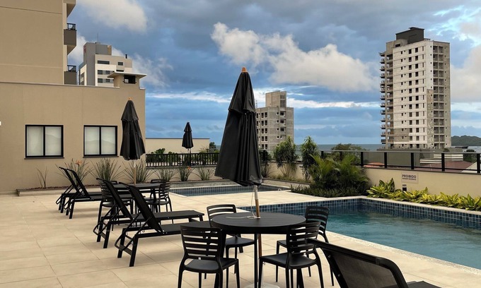 Penha Apartment | Beautiful cozy apartment in a home club close to the beach and Beto Carrero