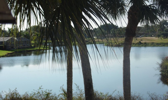 East Naples Condo | Beautiful lake view huge pool 4 miles to Gulf beaches
