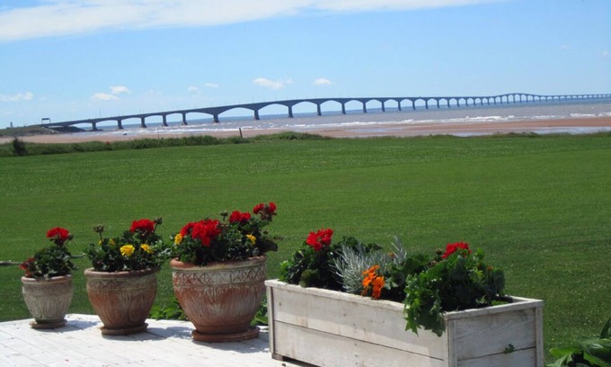 Borden-Carleton Cottage | Beautiful oceanfront beach house,family friendly,WiFi,lg deck,bbq .