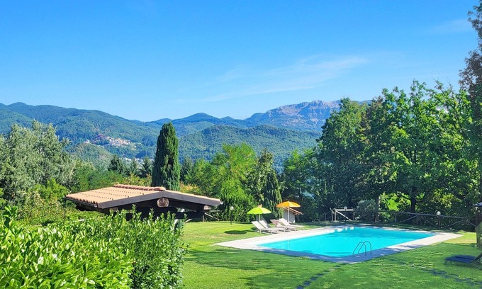 Camporgiano Villa | Beautiful private house with stunning views, large garden and private pool