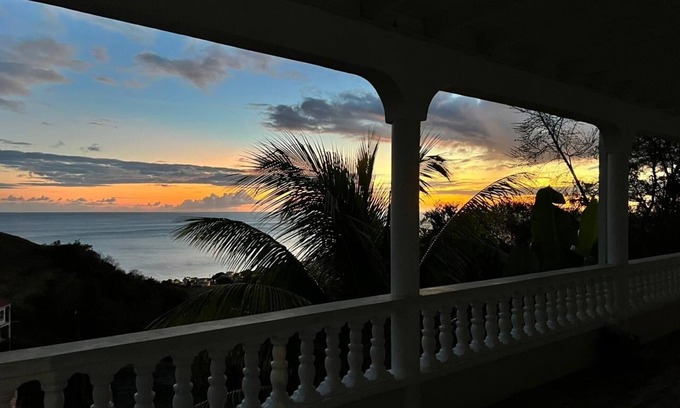 Mahaut Apartment | Beautiful sunset and Mountain View 2 bedroom apt