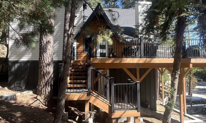 Blue Jay Cabin | Beautiful updated 3 level home with high ceilings, a wall of windows & game room