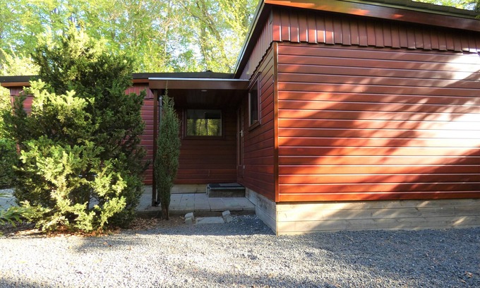 Marum Ski Chalet | Beautiful wooden chalet for rent against forest