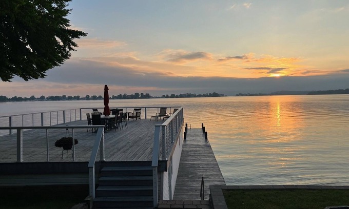 Sodus Point House | Beautifully updated home on the bay and golf course with dock and raised deck!