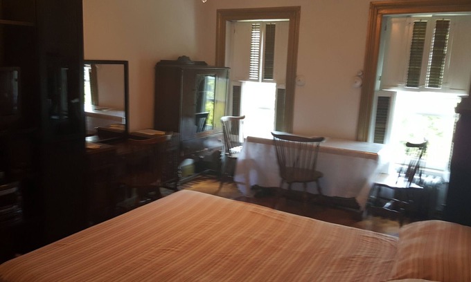 Clinton Hill Bed & Breakfast | BEDROOM # 1 WITH AN EVENT SPACE AND BACK PORCH