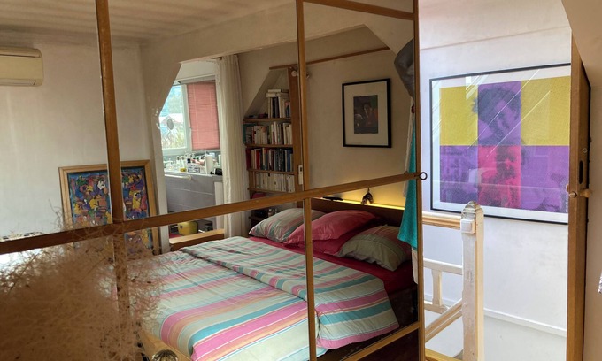 Arcueil Apartment | Bedroom, bathroom and terrace in artist's loft-atelier.