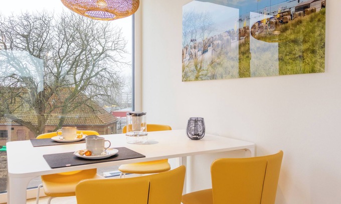 Marienleuchte Apartment | BeltBlick 30 - roof terrace. Sauna. Sea view. Family-friendly.