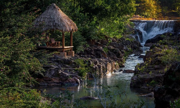 Blancaneau Cabin | Blancaneaux Lodge by Francis Ford Coppola