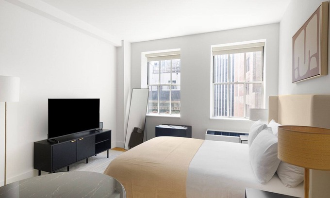 Financial District Apartment | Blueground | Financial District, rooftop, nr Wall St.