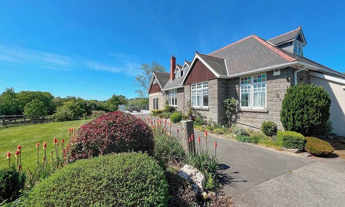 Tregaron Cottage | Boasting panoramic views, set in 15 acres, with open water lake and river.