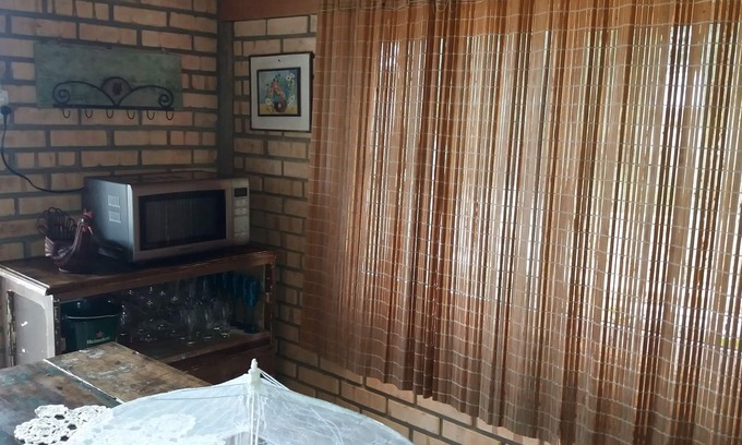 Zimbros House | Bombinhas, Zimbros Beach, Waterfront .Pe in the sand EVEN! DO NOT WASTE WATER.
