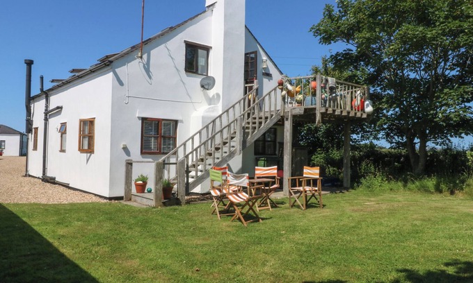 Rhoscolyn House | BORTH ARIAN BOAT HOUSE, pet friendly, with open fire in Rhoscolyn