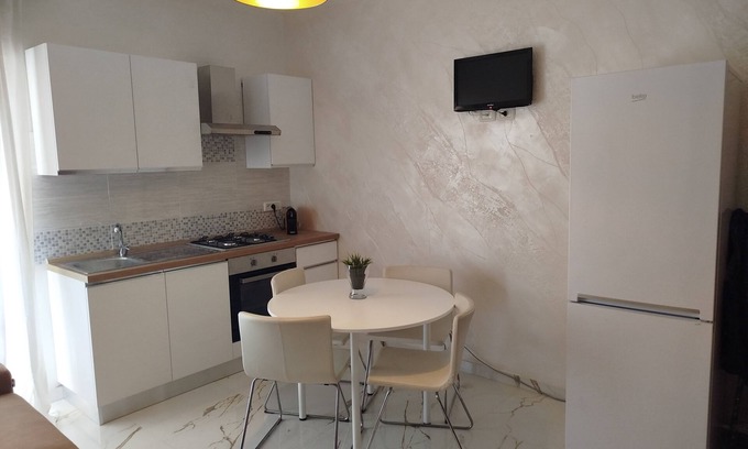 Calatabiano Apartment | Bouganville Residence - Family suite with swimming pool, tennis court, playground.