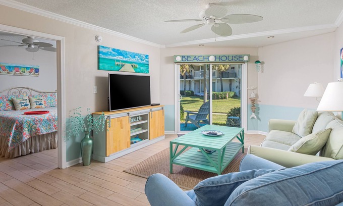 Villa Sabine Condo | Bright and Fun Beach Themed Condo - On Little Sabine Bay - Sand Dollar W107
