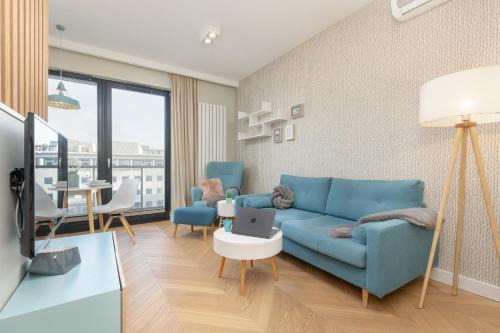 Mokotow Apartment | Bright Blue Apartment with Balcony, Parking and Air Conditioning in Warsaw by Noclegi Renters