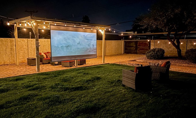 Encanto House | Bright dog-friendly home with large yard, outdoor projector, smart TVs, & W/D