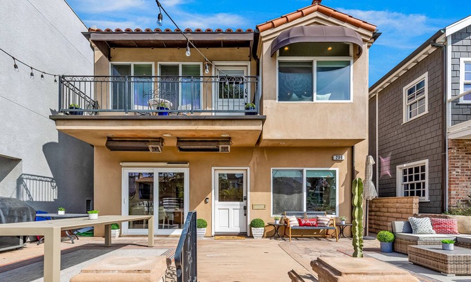 Naples House | Bright home on the channel with expansive patio & elevator