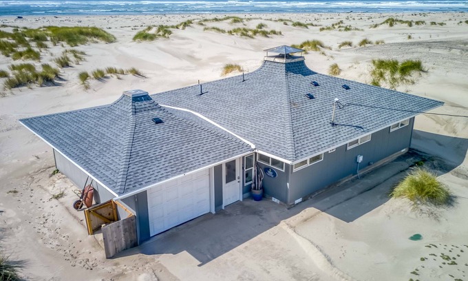 Bayshore House | Bright, Open, Updated Single-Level Oceanfront Home Right on Beach with Game Room