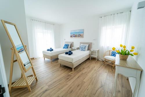 Lagos Apartment | Brisa do Mar - Apartments - T1 with Garden & AC near the Sea, Lagos