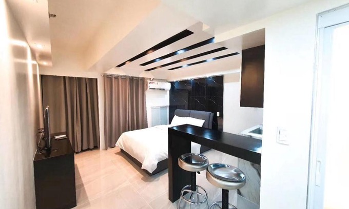 Paranaque Apartment | Burgundy McKinley Place Service Apartment
