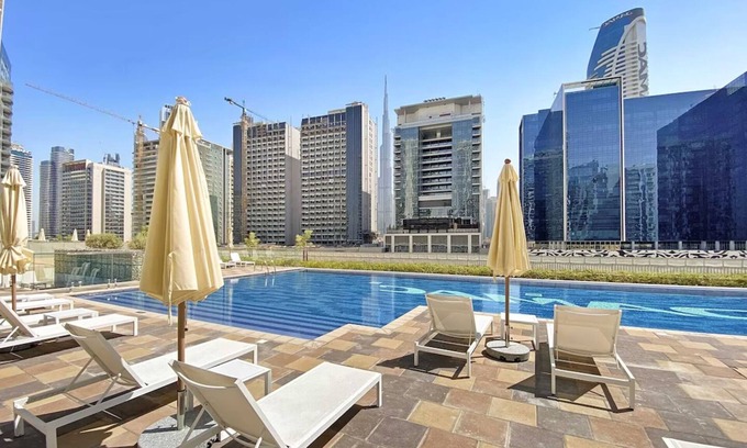 Downtown Dubai Apartment | Burj Khalifa View! Modern 2BR in Dubai's Business Bay - waterfront canal