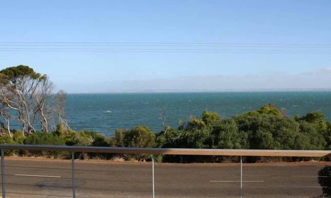 Kingscote House | Camelot - opposite the foreshore. Stunning sea views. Now with Free Wi Fi