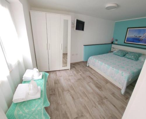 Cala Gonone Apartment | Casa al mare Orchidea - Motoparking - Wifi Free - AC
