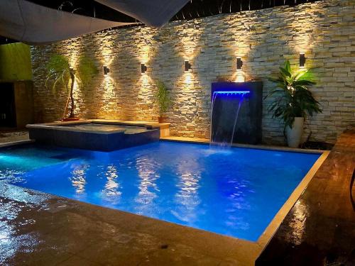 Puerto Barrios Apartment | Casa azul con Generador electrico , Piscina y jacuzzi