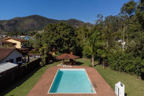 Lumiar House | Casa Di Maria 4 Quartos a 500m Centro - Sauna, Piscina, Fogão a Lenha, Churrasqueira - ACESSO PRIVATIVO AO AO RIO - Ideal para famílias
