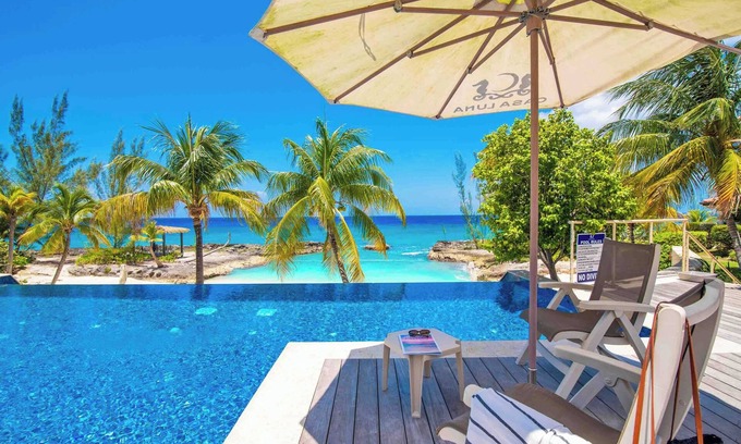 George Town Villa | Casa Luna 14: Gated Resort South of 7Mile Beach w/Beach Cove, Communal Pool, Heated Spa + Gym